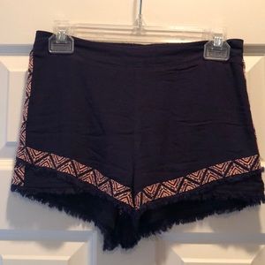 Navy shorts with pink embroidery